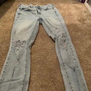 Size 3 light blue ripped skinny jeans